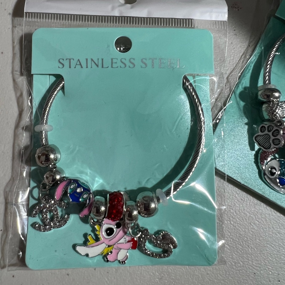 Stainless Steel Stitch Charm Bracelet with Pink Accents